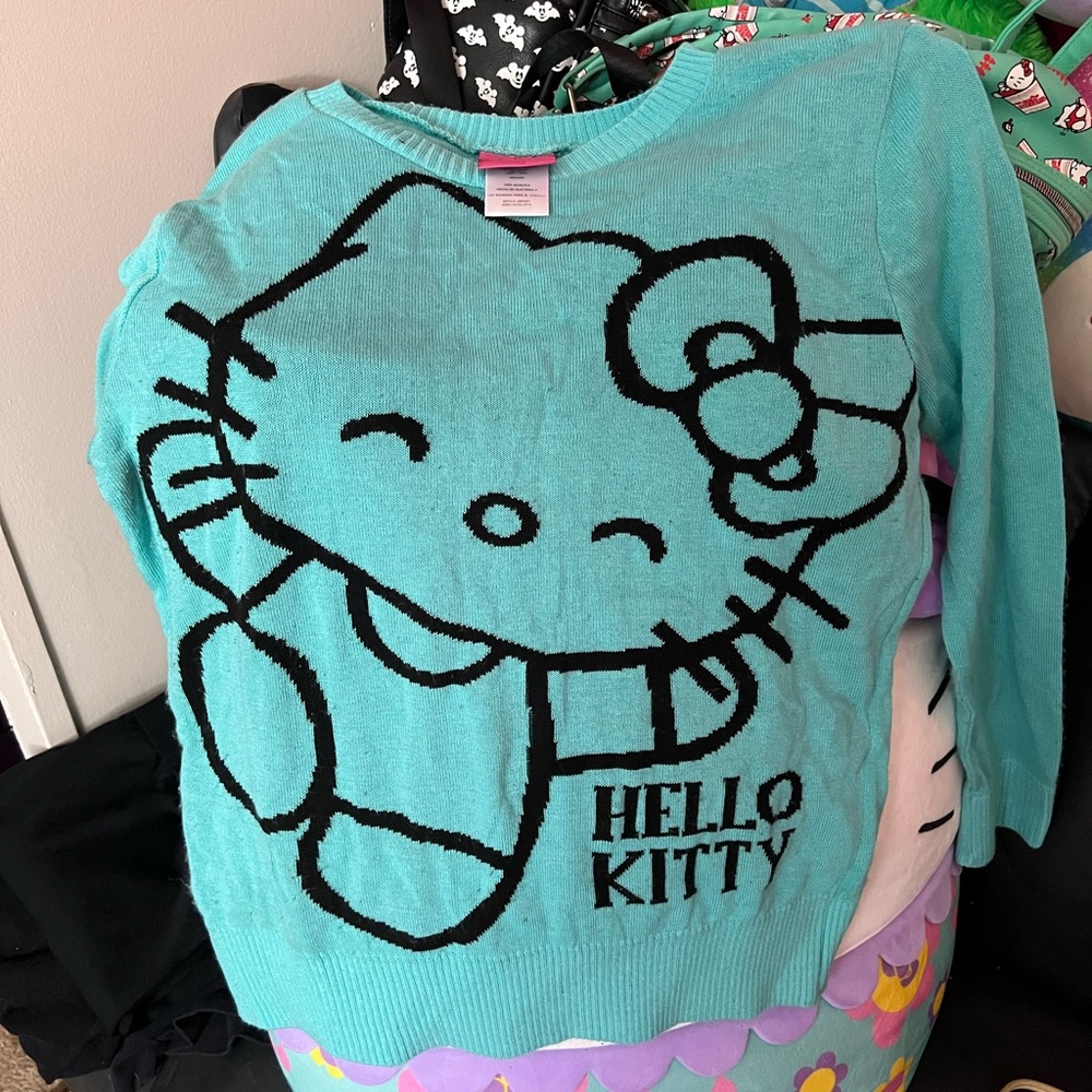 Hello Kitty women’s size L sweater. In great condition. Only wore once.